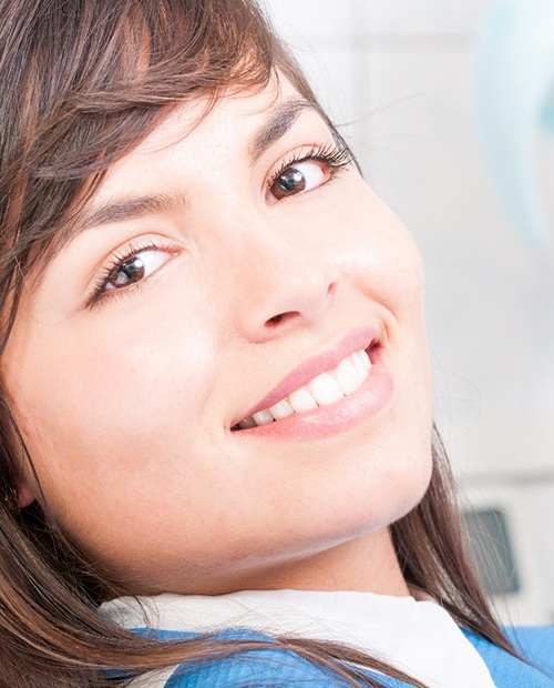 Close-up of a female dental patient smiling